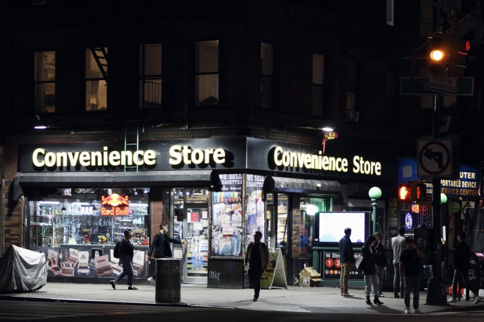 Nighttime shot of a convenience store on West 14th Street in New York City